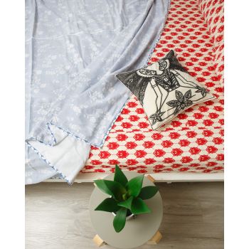 Close view of red pattern printed bedsheet