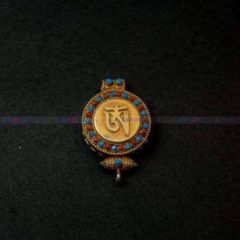 Tibetan om design pendant.
