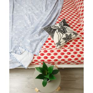 Close view of red pattern printed bedsheet