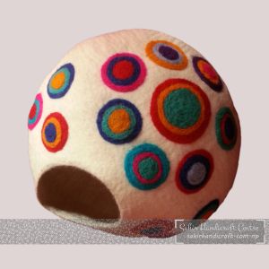 White Cat Cave with Colorful Rings