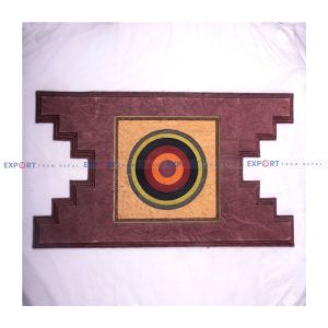 Paper wall hanging made with lokta with paper roll in the middle in aankhijhyal design.