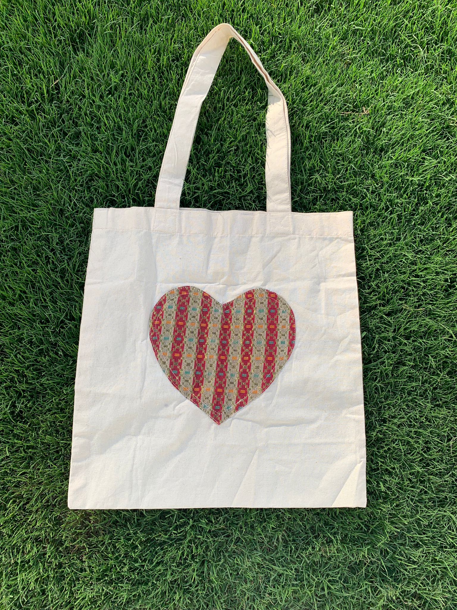 Heart print dhaka bag